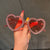Damen Herzförmige Sonnenbrille mit Strassverzierung Karnz