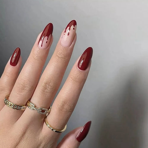 Kunstvolle Nagelspitzen mit Tropfen-Design Karnz