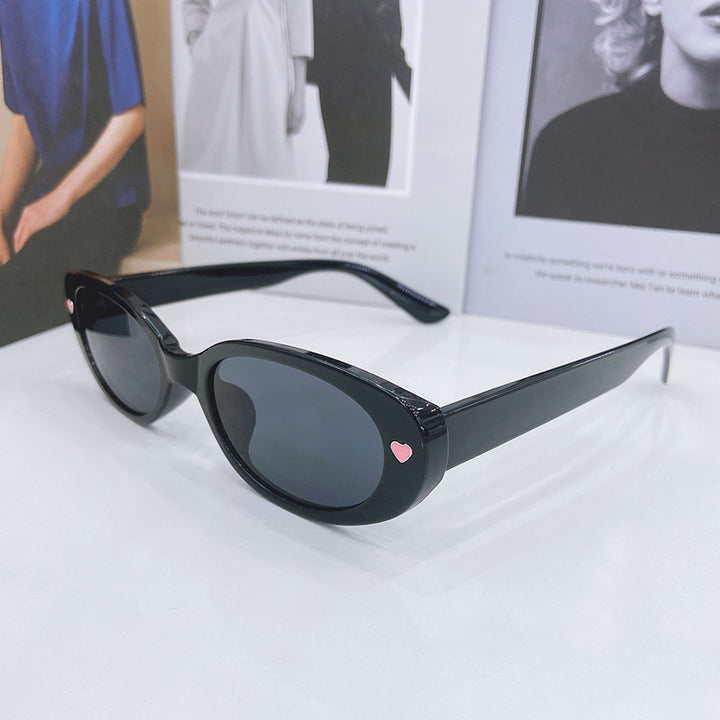 Modische Cat-Eye Sonnenbrille mit Herzen Karnz