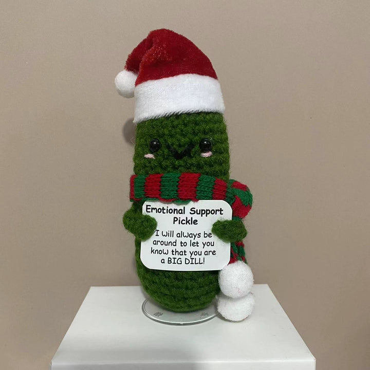 Plüschknuffel mit Weihnachtsmannhut und Schal