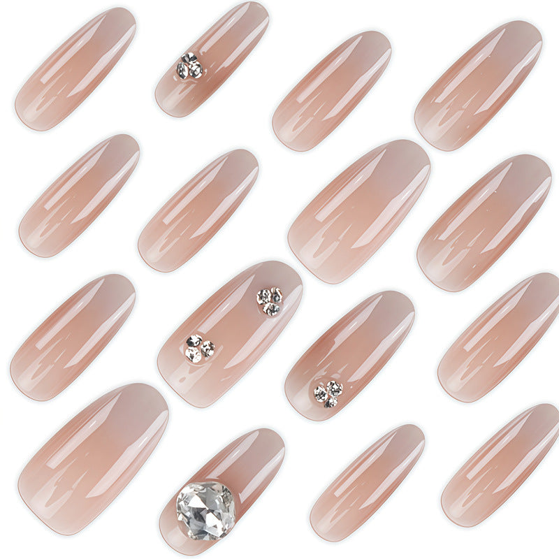 Artisanal Press-On Nail Set mit funkelnden Strasssteinen Karnz