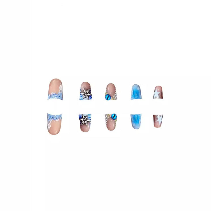 Künstlerische Acrylnagelverzierungen mit Edelsteinakzenten Karnz