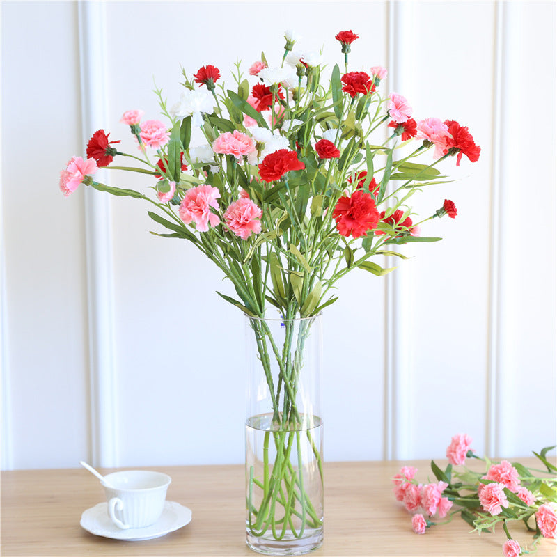 Realistische Seidenblumenstielarrangement