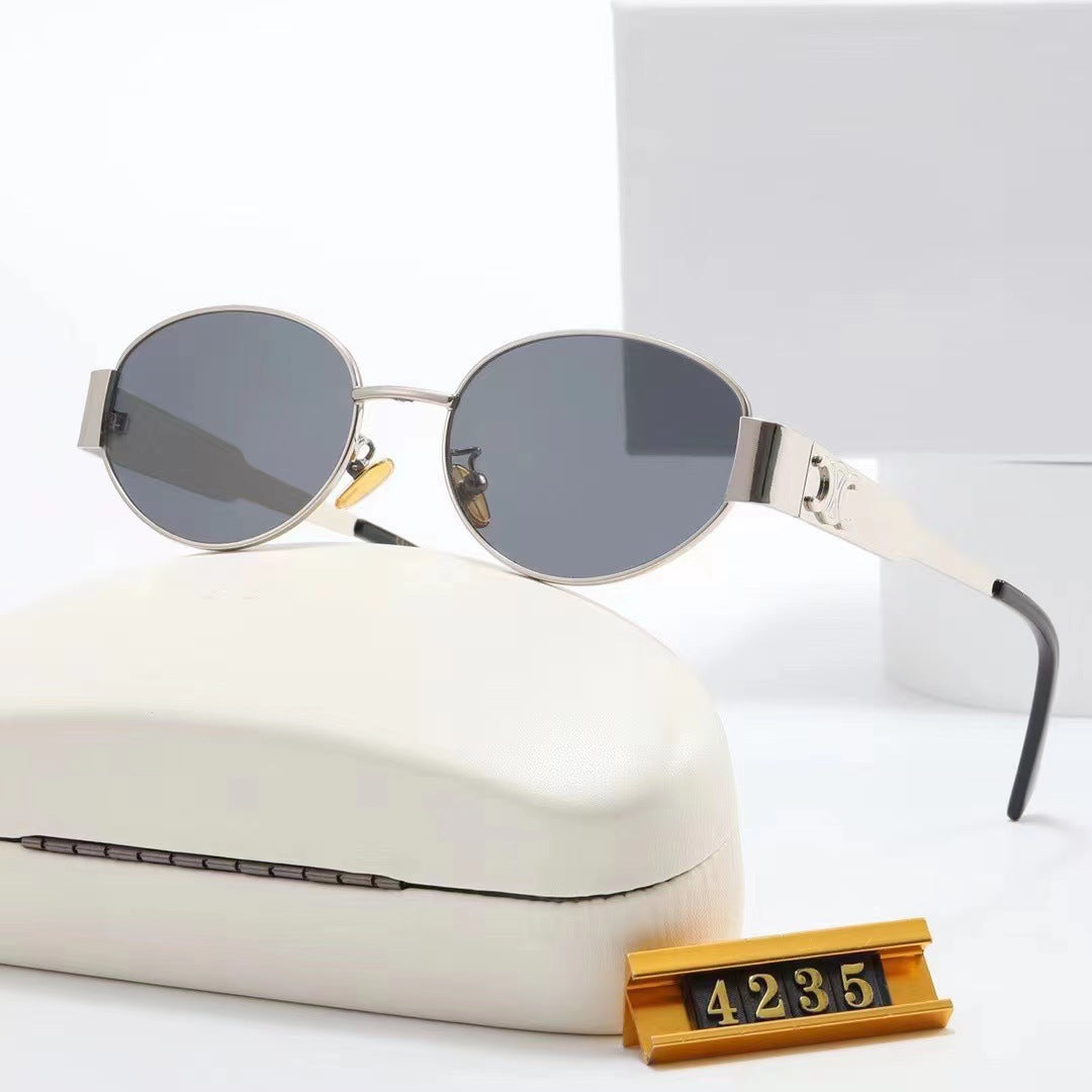 Damen elegante ovale Sonnenbrille mit goldfarbenem Rahmen Karnz