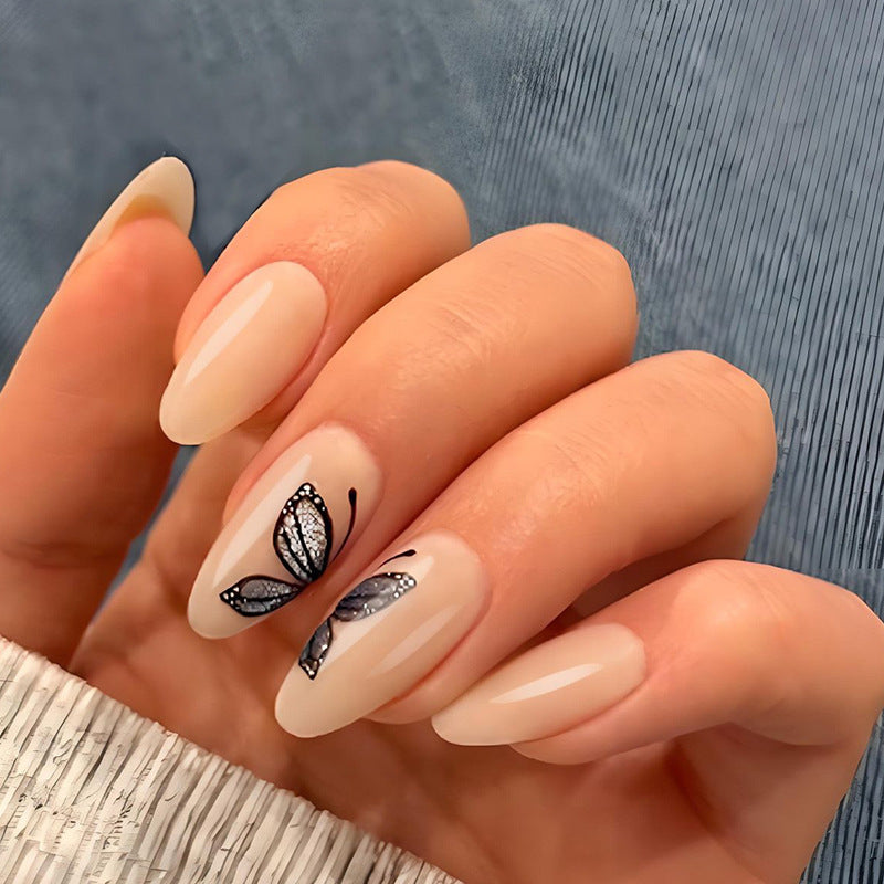Kunstnagelset mit filigranen Schmetterlingsmotiven und elegantem Finish Karnz