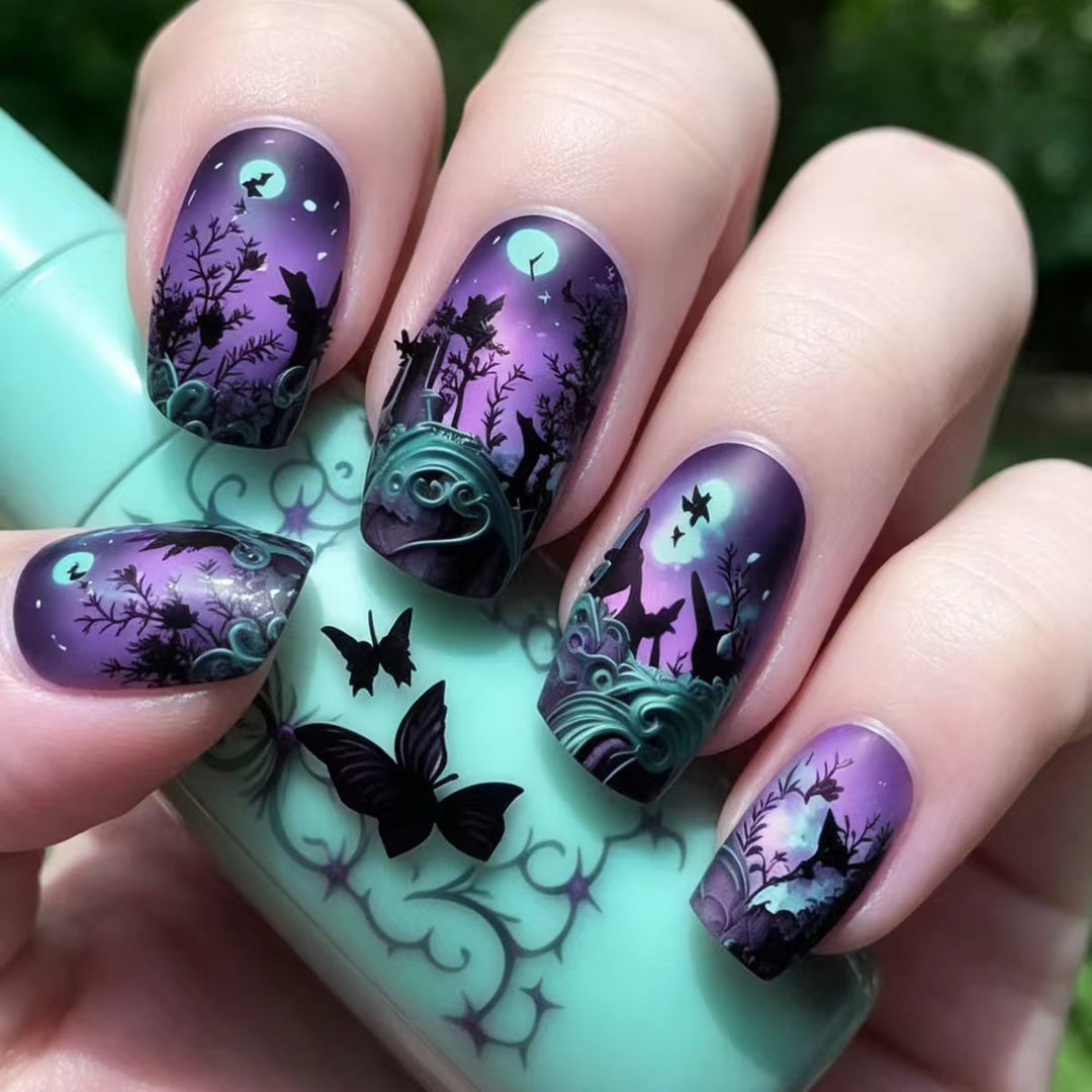 Kunstnageldesign mit Schmetterling und Nachtmotiv Karnz