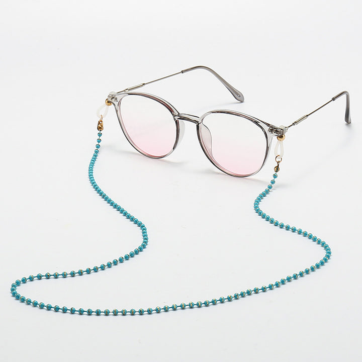 Modische Katzenaugenbrille mit Perlenkette Karnz