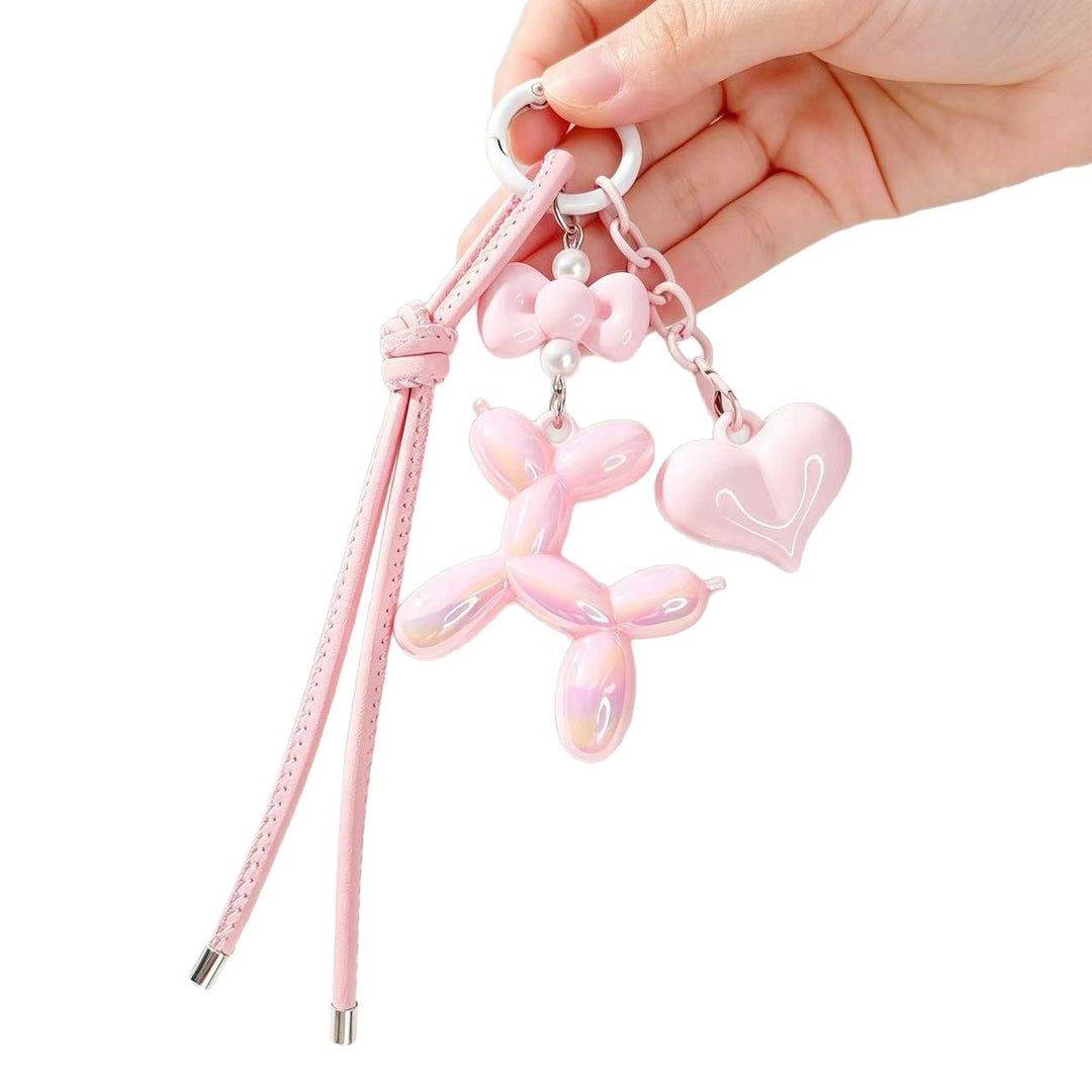 Verspielter Schlüsselanhänger mit Herz und Ballonhund Karnz