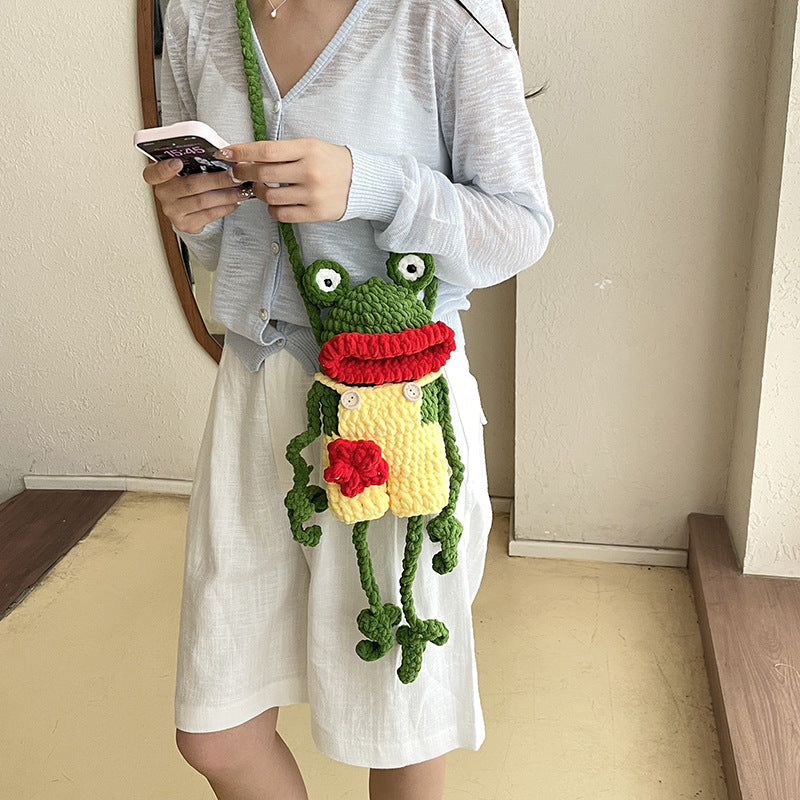 Verspielter frosch-themen gehäkelter rucksack