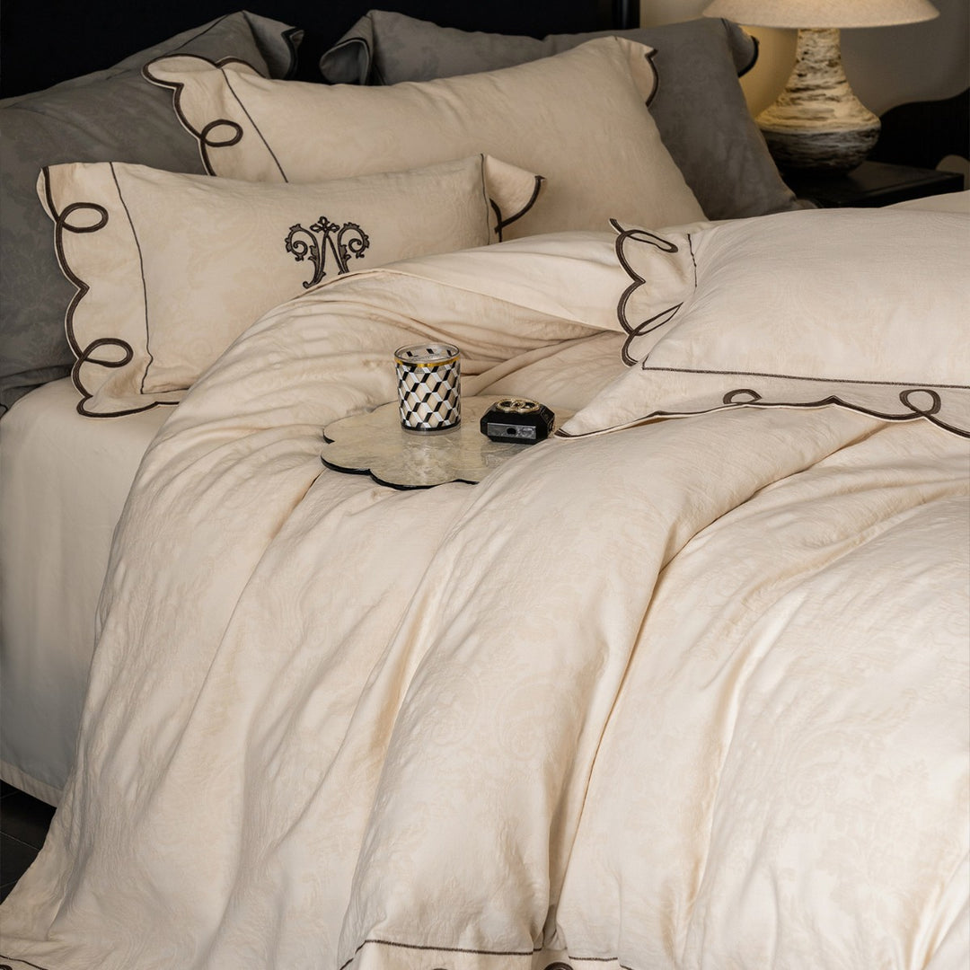 Besticktes Wellen-Loop Jacquard Bettbezug-Set mit passenden Kissenbezügen