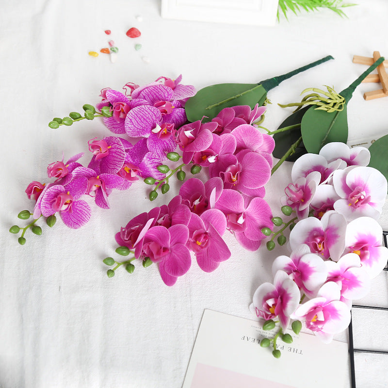 Lebensechte künstliche Orchideenstammarrangement