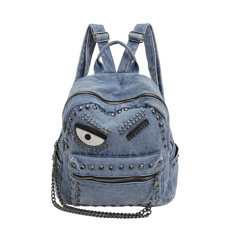 Stylischer Denim-Rucksack mit dekorativen Nieten