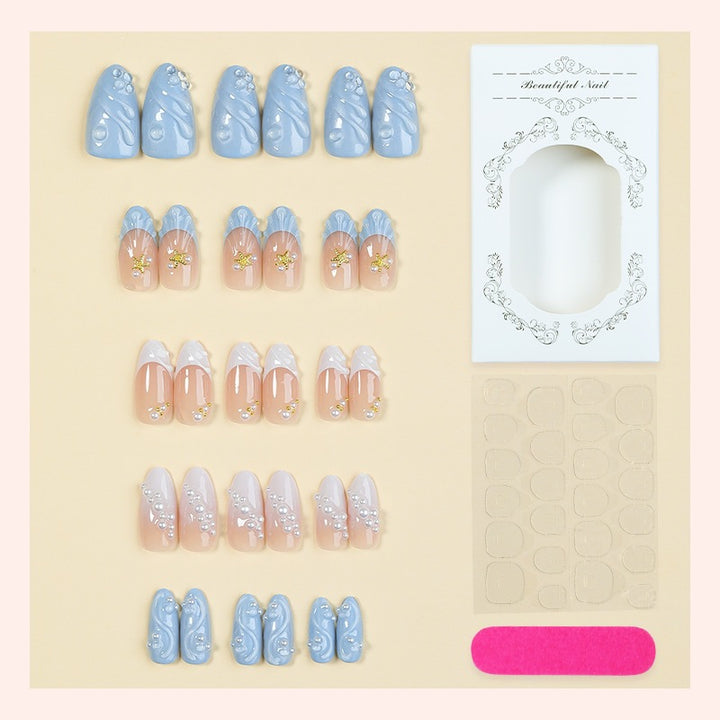 Kunstnagelset mit floralen und glitzernden Akzenten Karnz 1789119191