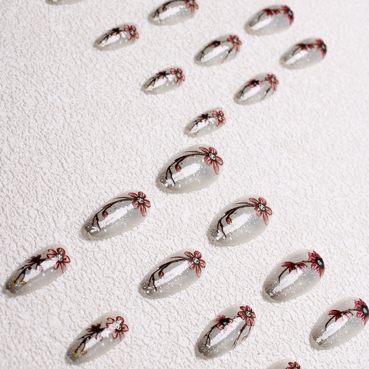 Künstlerisches Floral Press-On-Nagelset Karnz