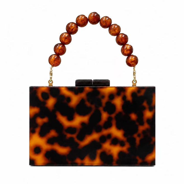 Elegante akribisch strukturierte Handtasche