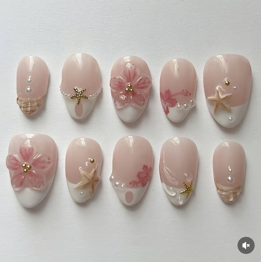 Kunstnagelset mit floralen und maritimen Designs Karnz