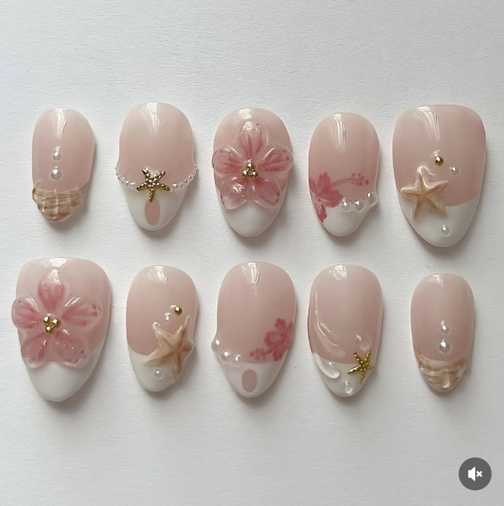 Kunstnagelset mit floralen und maritimen Designs Karnz