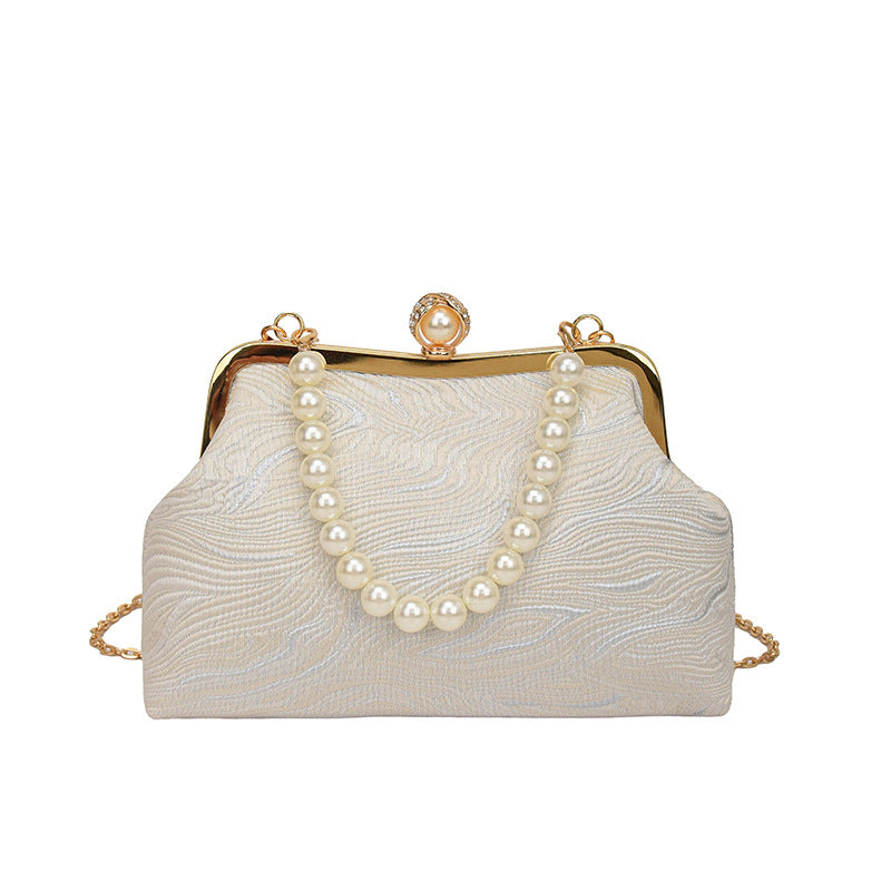 Elegante perlenverzierte Abendhandtasche