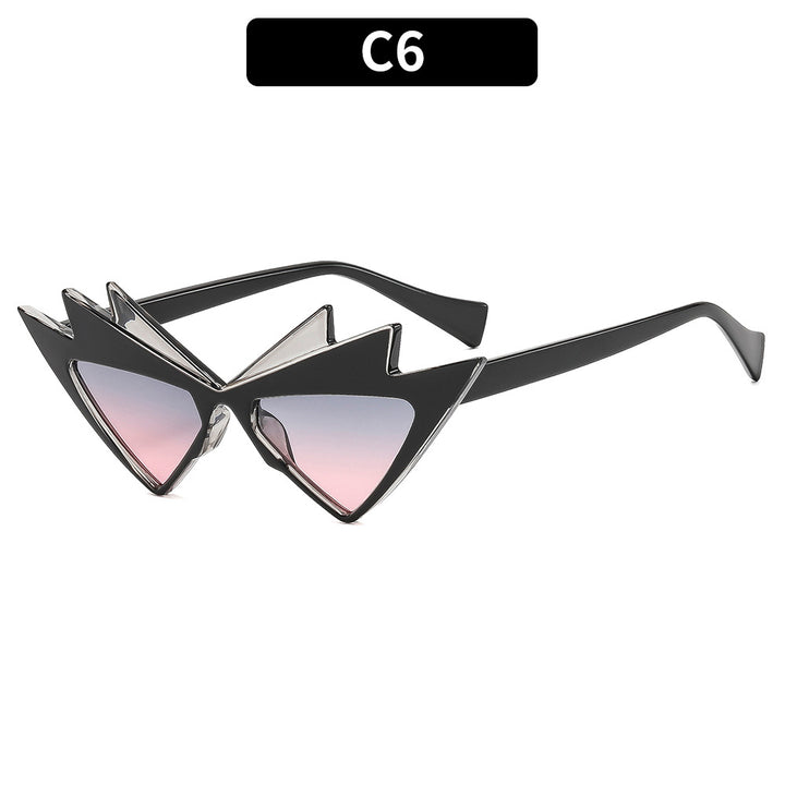 Kühne Katzenaugen-Sonnenbrille mit einzigartigem grafischem Rahmen