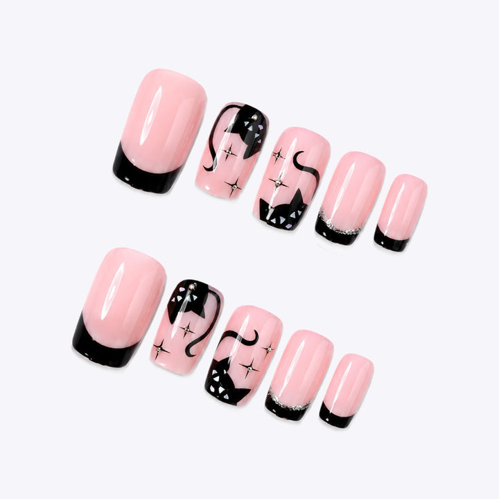 Kunstnagelset mit Glamourösen Schwarz-Designs und funkelnden Akzenten Karnz