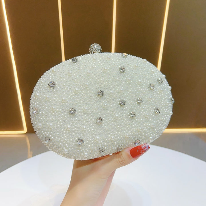 Perlenverzierte Abend-Clutch
