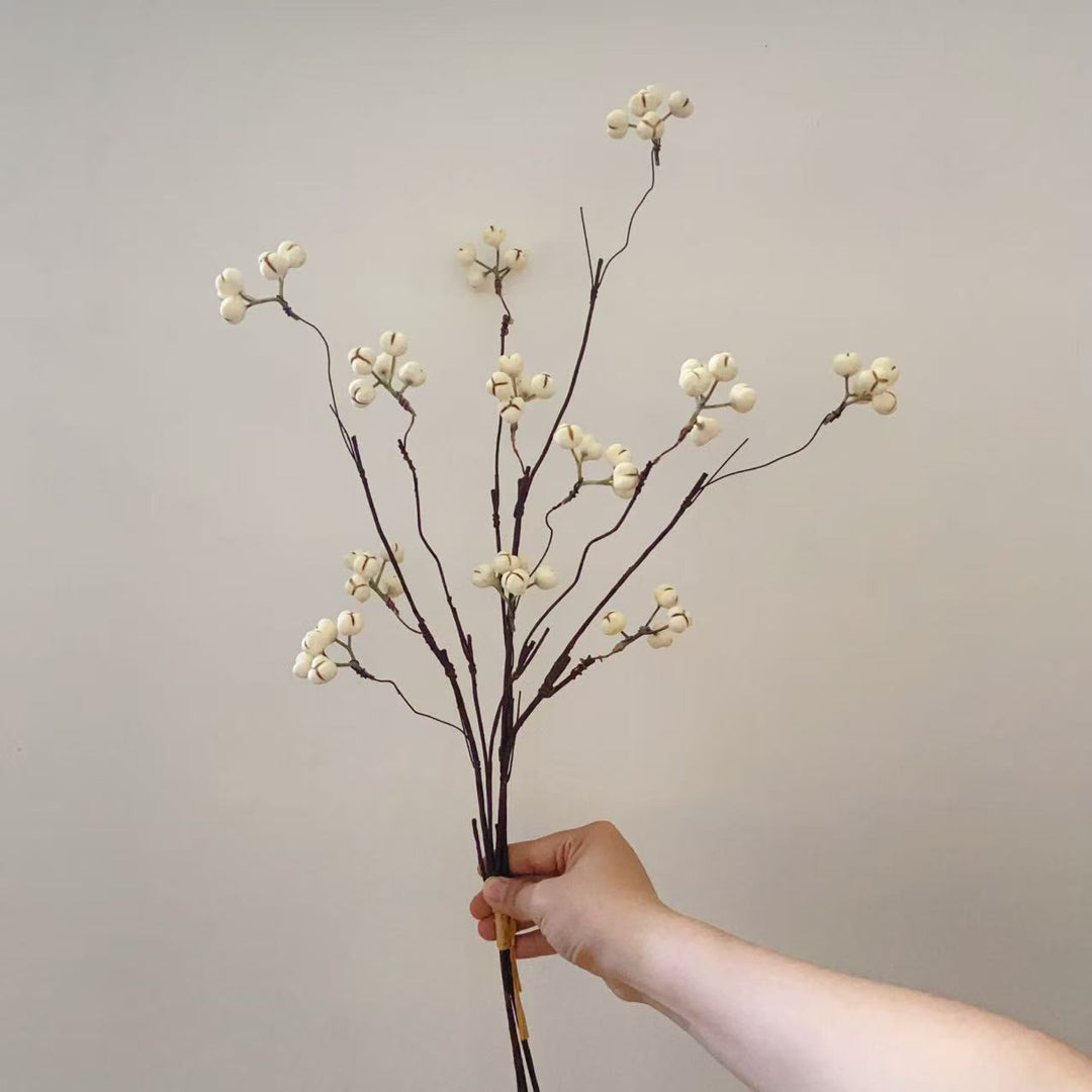 Dekorative Blumenstielanordnung