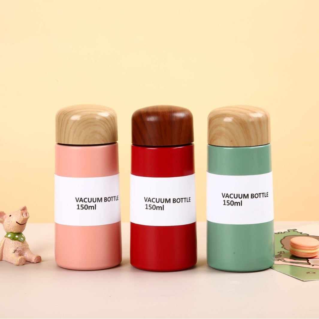 Damen vakuumisolierte Wasserflasche mit innovativem Holzdeckel Karnz