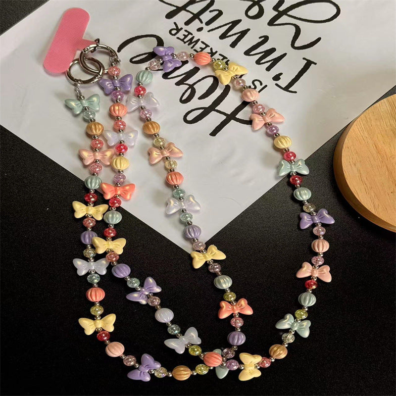 Charmante Schmetterlingsperlen Brillenband Karnz