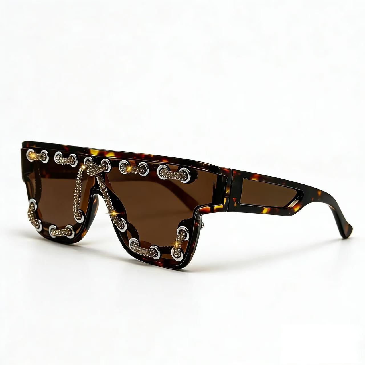 Damen Sonnenbrille mit extravagantem Design und dekorativer Kettenverzierung Karnz