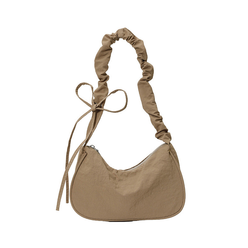WoTexturiertes Stoff Sling Bag Karnz