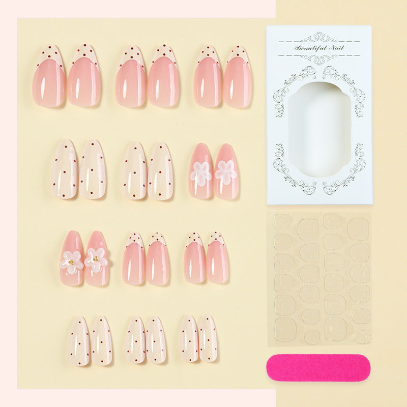 Elegantes Press-On Nail Set mit floralen und gepunkteten Designs Karnz