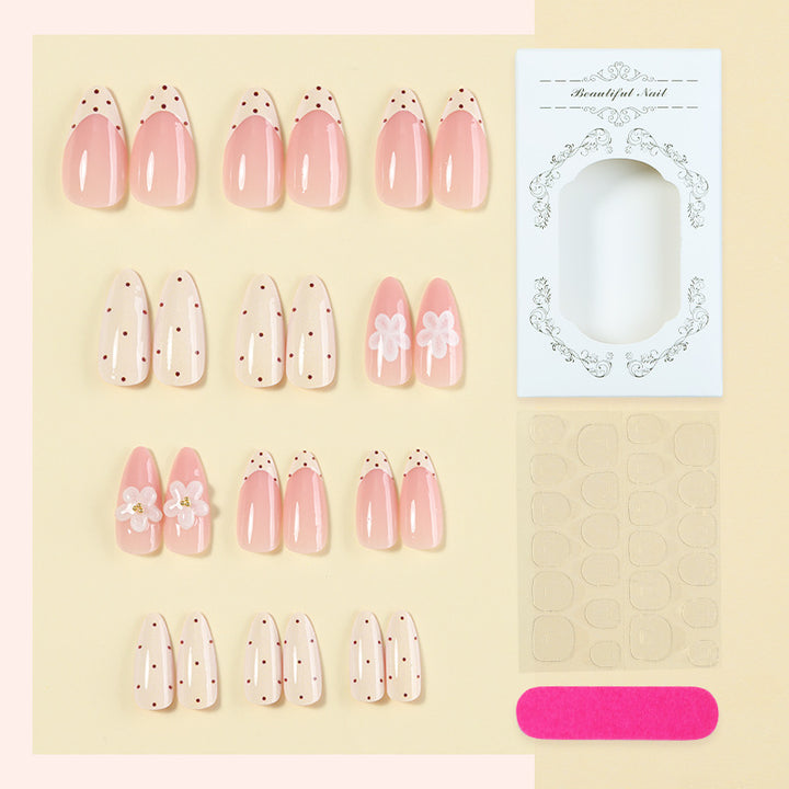 Elegantes Press-On Nail Set mit floralen und gepunkteten Designs Karnz