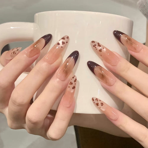 Künstlerische Stiletto Press-On Nägel mit einzigartigen Tierdruckakzenten Karnz