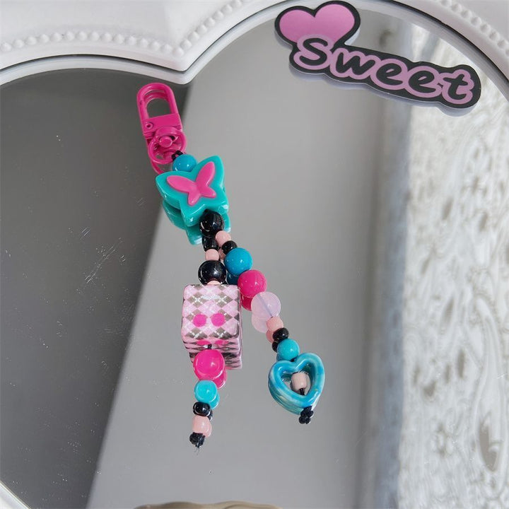Dekorativer Charm-Handyband Karnz