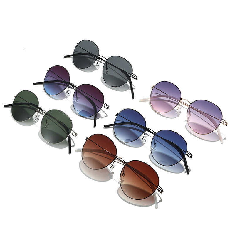 Damen runde Sonnenbrille mit leichtem Metallrahmen und gradienten Gläsern Karnz