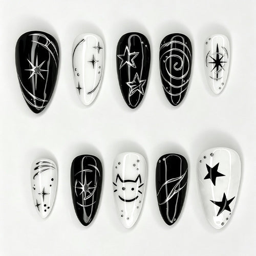 Kunstnagelset mit kreativen star-motiven und glitzernden Akzenten Karnz