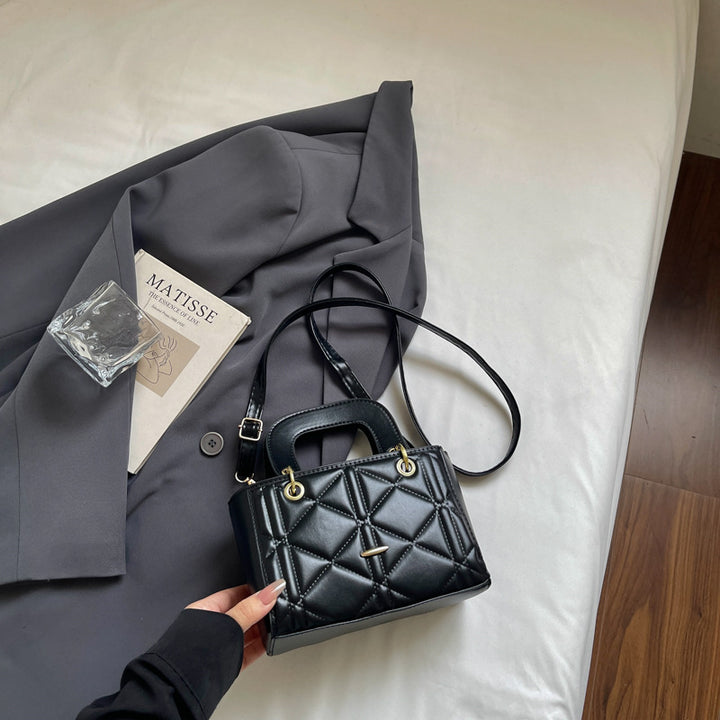 Gepolsterte Mini-Handtasche mit dualen Trageoptionen