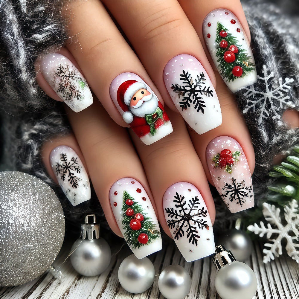 Festliche Kunstnägel mit Weihnachtsmotiven Karnz