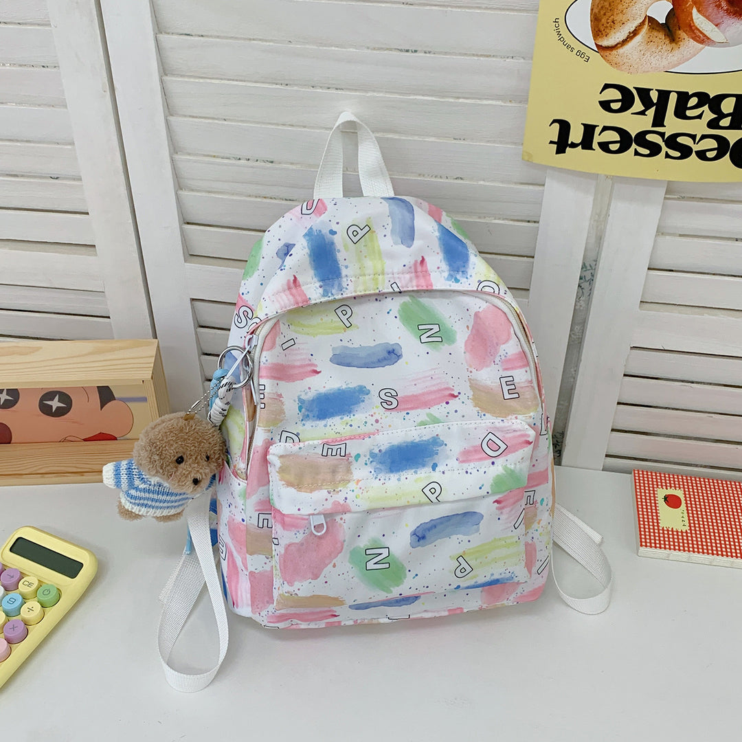 Verspielt gepunkteter Mini-Rucksack