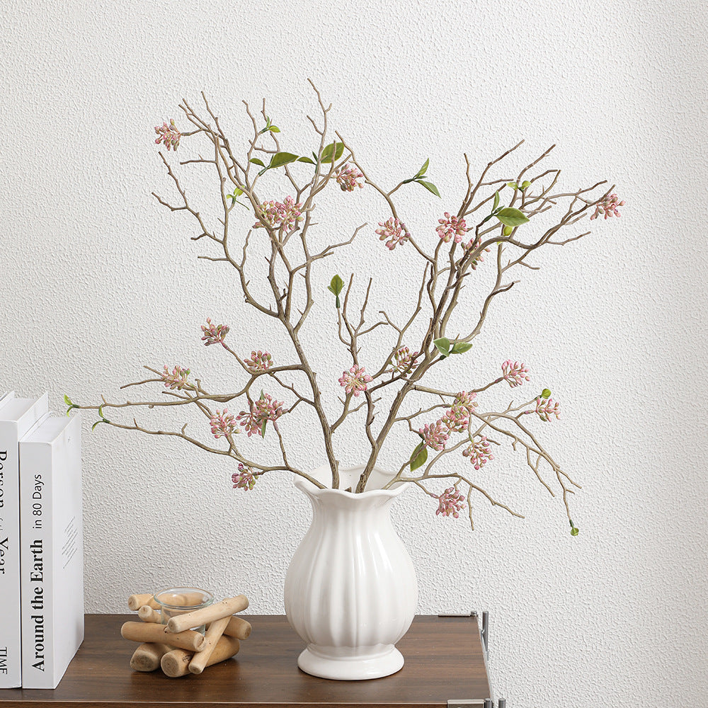 Dekorativer Kunstzweig mit detailverliebten Blüten Karnz