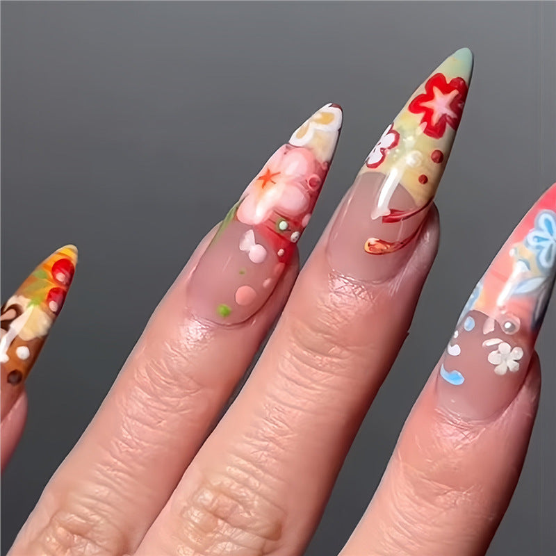 Künstlerische florale Stiletto Press-On Nägel Karnz