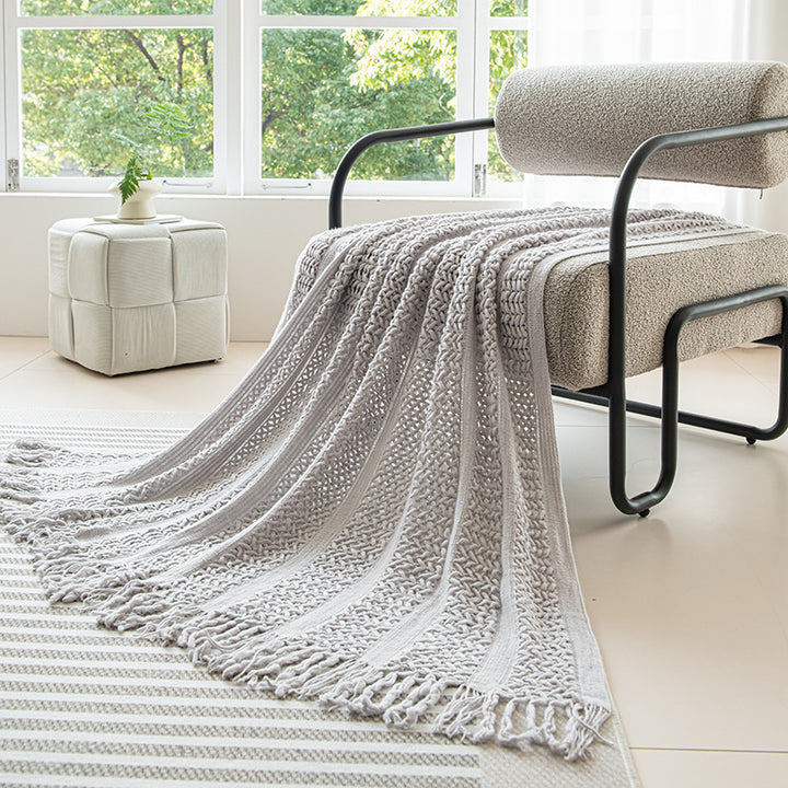Gemütliche Strickwurfdecke