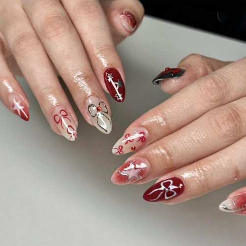 Kunstvolle Nagelverlängerungen mit festlichem Design Karnz