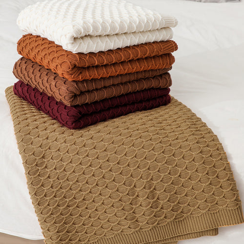 Gemütliche Strickwurfdecke