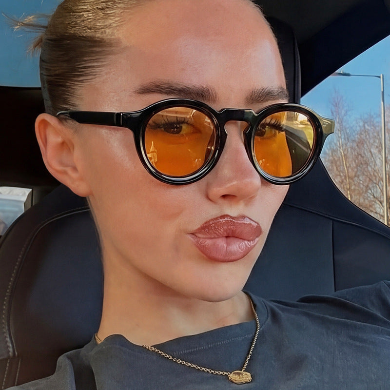 Damen modische runde Sonnenbrille mit transparentem Rahmen und UV-Schutz Karnz