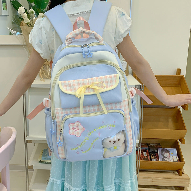 Verspielt gemusterter Schulrucksack Karnz