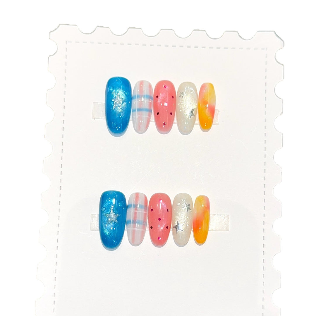 Kreatives Kunstnagelset mit Glitzer- und Sternendesign Karnz
