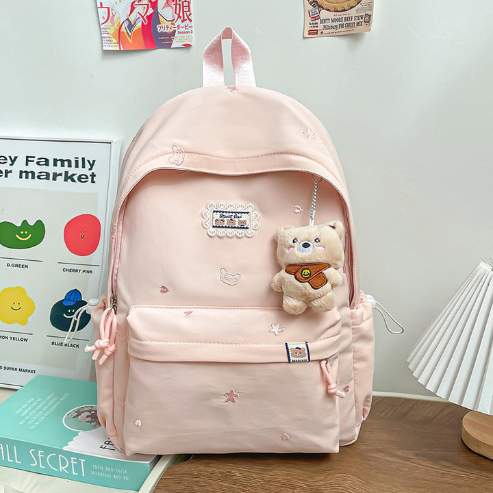 Stylischer backpack mit floralem Schmuck Karnz