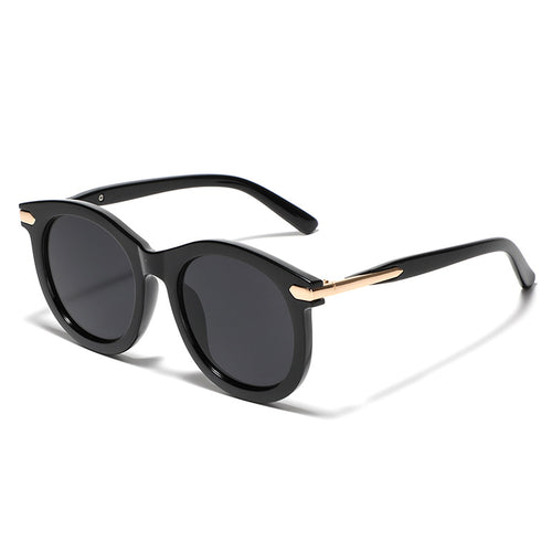 Damen modische Sonnenbrille mit transparentem Rahmen und goldenen Akzenten Karnz