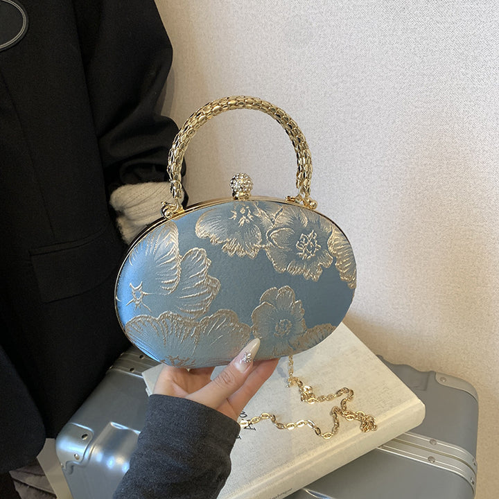 Elegante Blumen Abendtasche Karnz